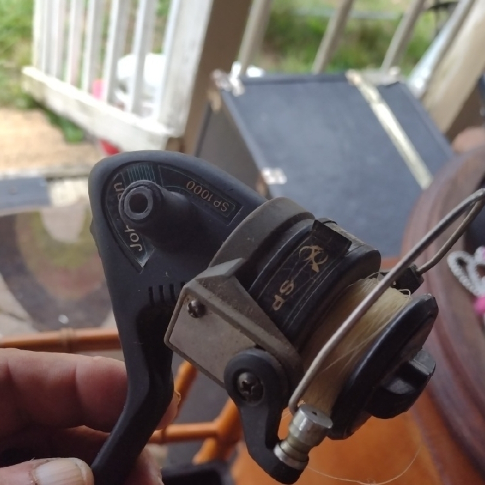Johnson SP1000 Black and Silver Fishing Reel